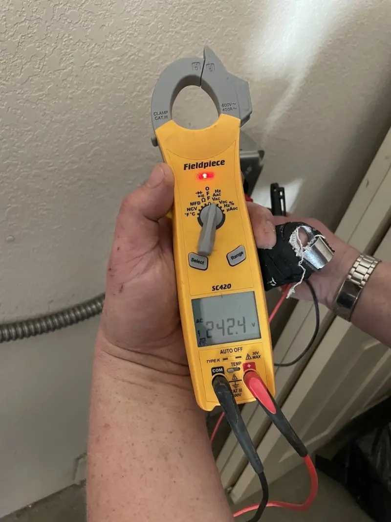 Voltage testing with clamp meter during Outlet Installation in Fruitridge Pocket